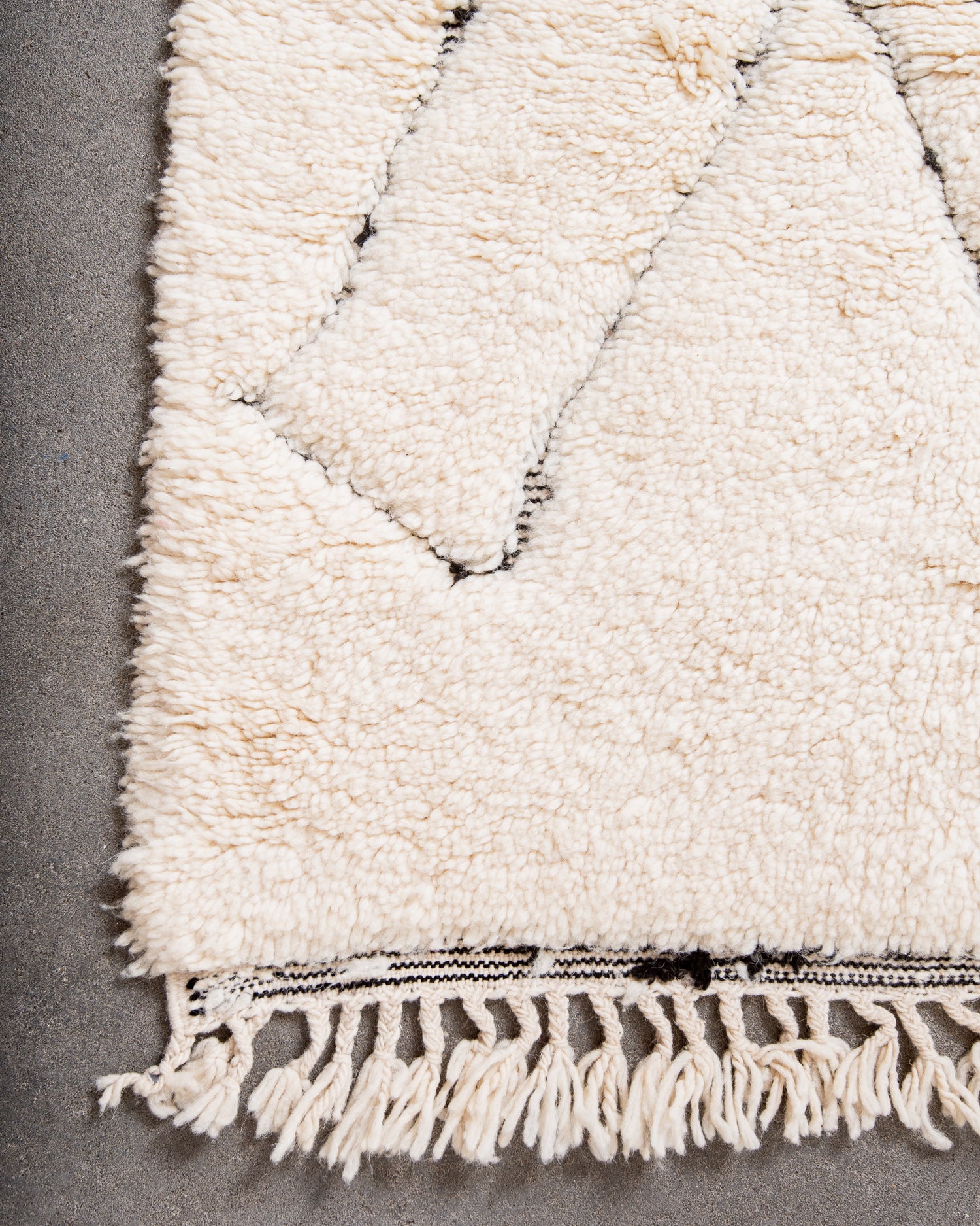 Modern, designer, handcrafted Berber rug from Morocco. Beniourain carpet with beautiful colours and patterns and fluffy wool texture.